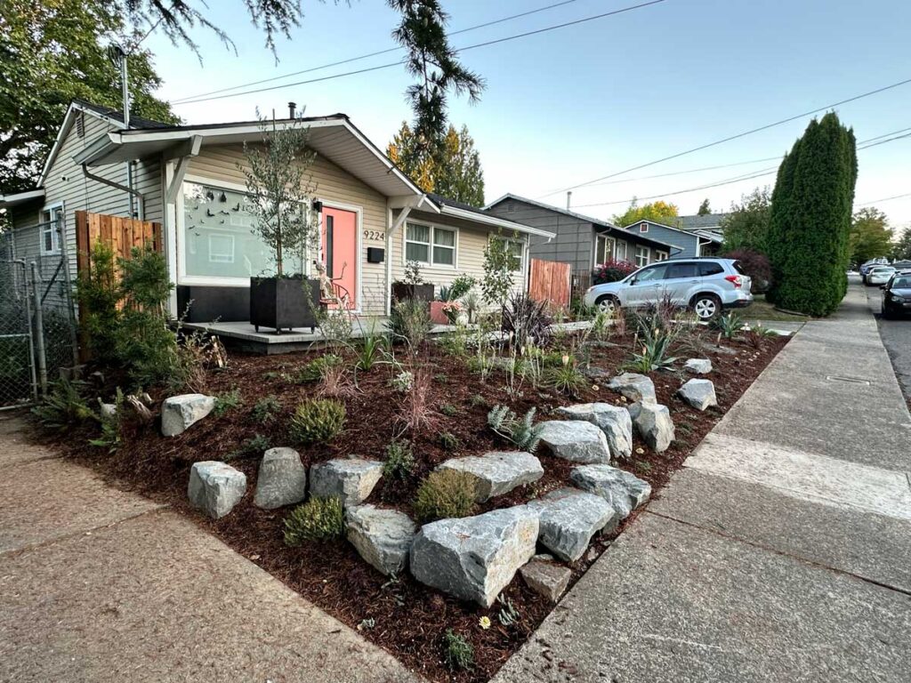 modern grassless landscaping boulders
